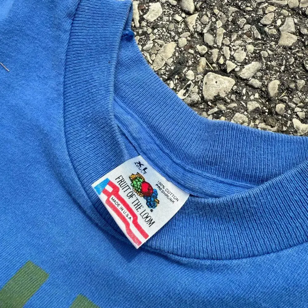 Vintage 90s Michelin Man All Over Print Graphic T-Shirt